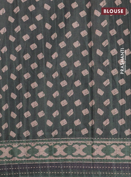 Semi tussar saree dark green with allover prints and kantha stitch work border