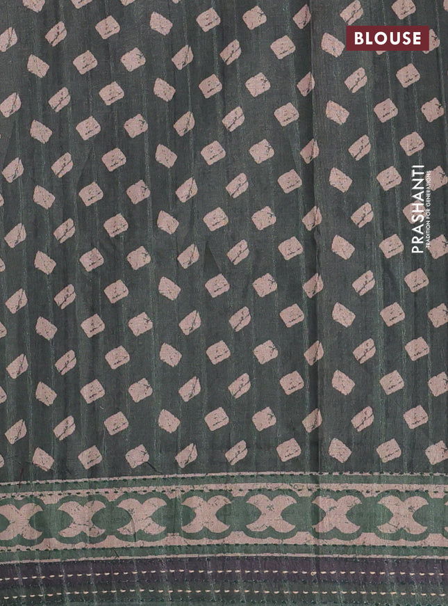 Semi tussar saree dark green with allover prints and kantha stitch work border