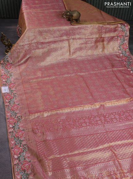 Semi kanchipuram tissue silk saree dual shade of pink with allover zari woven brocade weaves and floral design embroidery border