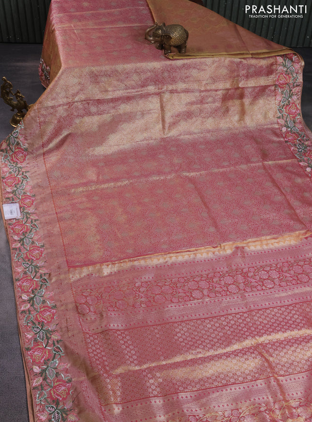 Semi kanchipuram tissue silk saree dual shade of pink with allover zari woven brocade weaves and floral design embroidery border