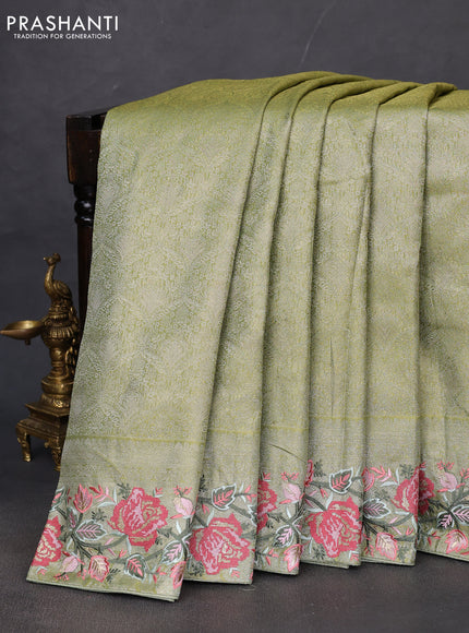 Semi kanchipuram tissue silk saree lime green with allover zari woven brocade weaves and floral design embroidery border