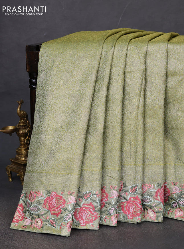 Semi kanchipuram tissue silk saree lime green with allover zari woven brocade weaves and floral design embroidery border