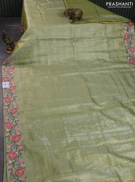 Semi kanchipuram tissue silk saree lime green with allover zari woven brocade weaves and floral design embroidery border