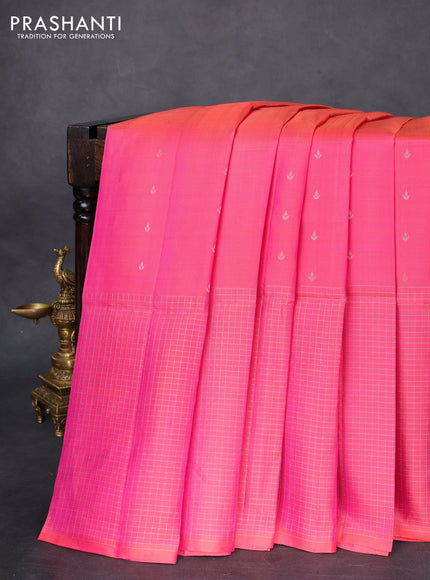 Pure soft silk saree dual shade of pinkish orange with allover silver zari buttas and long zari checked border