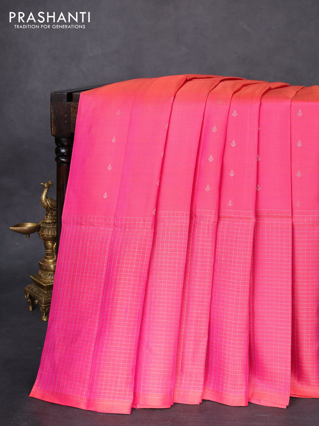Pure soft silk saree dual shade of pinkish orange with allover silver zari buttas and long zari checked border