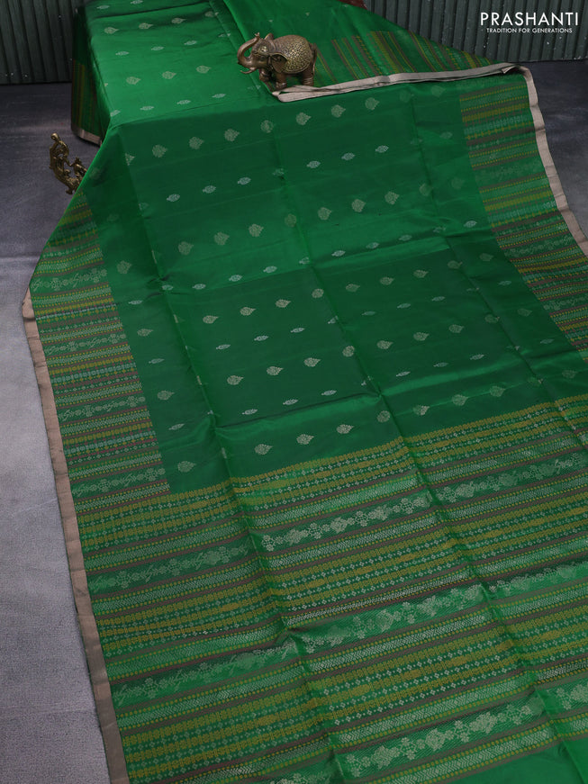 Pure soft silk saree green with allover silver zari buttas and long zari checked border