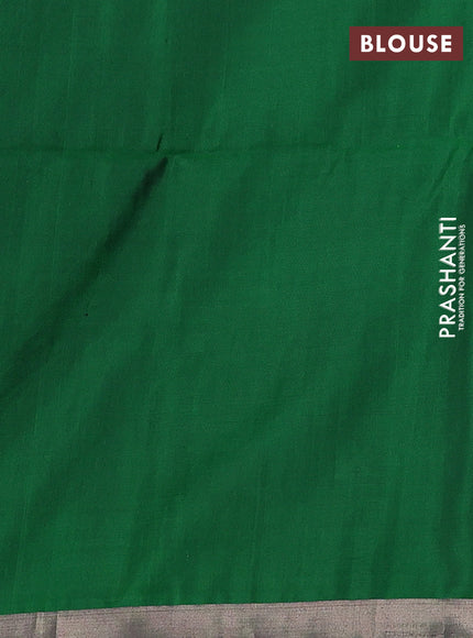 Pure soft silk saree green with allover silver zari buttas and long zari checked border