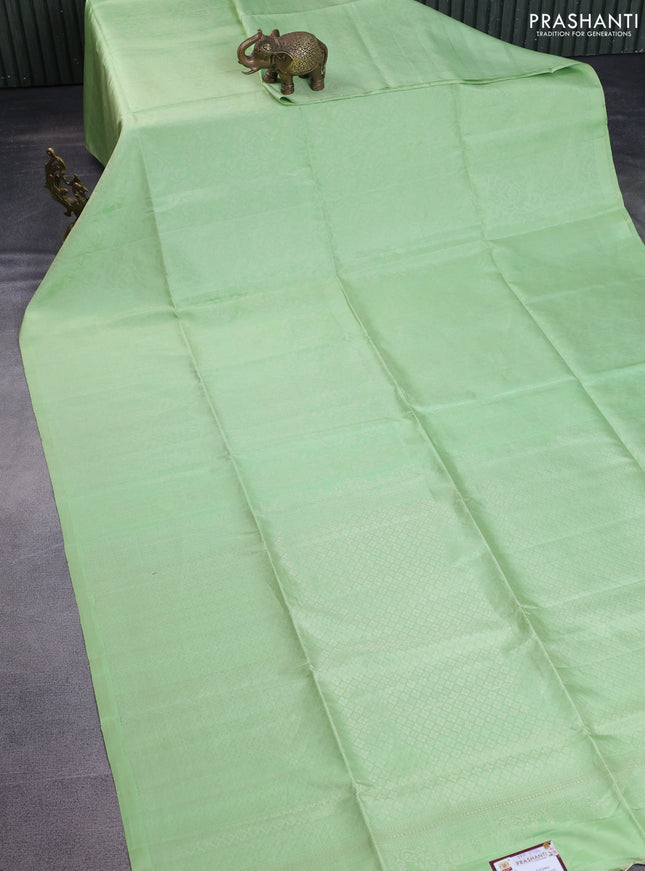 Pure soft silk saree pista green with allover silver zari woven brocade weaves in borderless style
