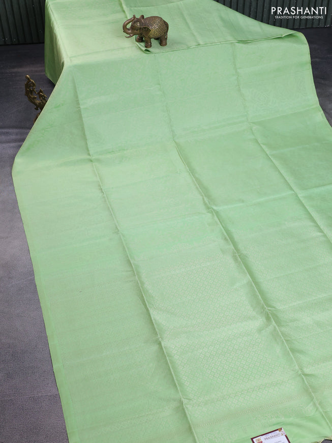 Pure soft silk saree pista green with allover silver zari woven brocade weaves in borderless style