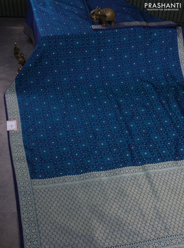 Banarasi semi mushru silk saree dual shade of blue with allover self emboss & zari buttas and zari woven border