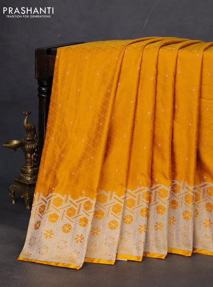 Banarasi semi mushru silk saree mustard yellow with allover self emboss & zari buttas and zari woven border
