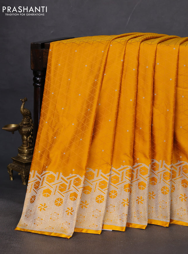Banarasi semi mushru silk saree mustard yellow with allover self emboss & zari buttas and zari woven border