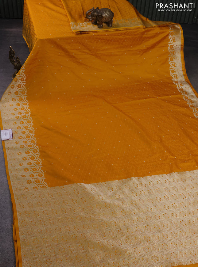 Banarasi semi mushru silk saree mustard yellow with allover self emboss & zari buttas and zari woven border