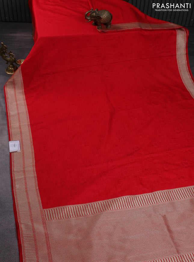 Banarasi semi mushru silk saree red with allover self emboss and zari woven border