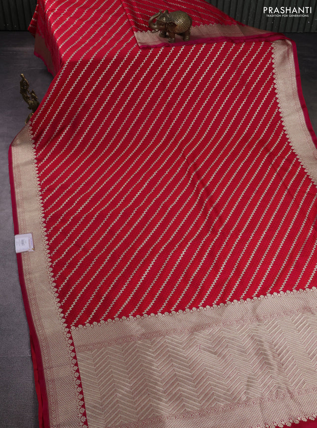 Banarasi semi mushru silk saree pink and red with allover self emboss & zari weaves and zari woven border