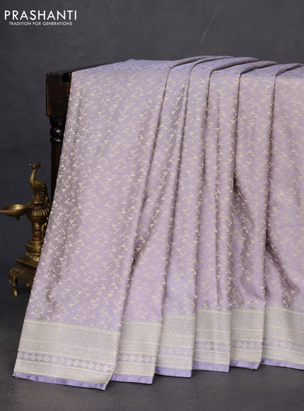 Banarasi semi mushru silk saree pastel grey with allover self emboss & zari buttas and zari woven border