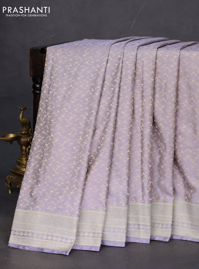 Banarasi semi mushru silk saree pastel grey with allover self emboss & zari buttas and zari woven border