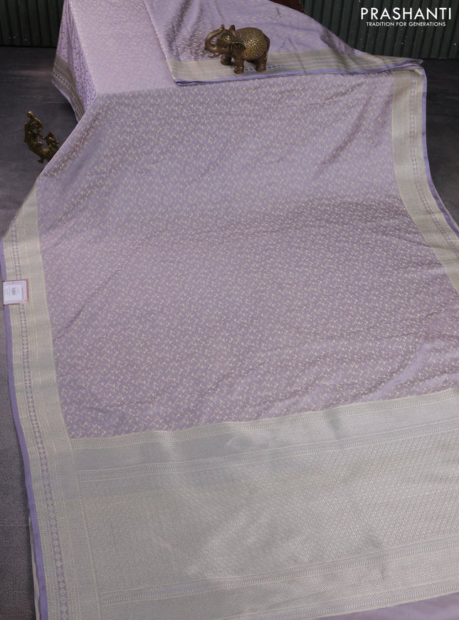 Banarasi semi mushru silk saree pastel grey with allover self emboss & zari buttas and zari woven border
