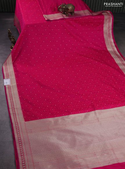 Banarasi semi mushru silk saree pink with allover self emboss & zari buttas and zari woven border