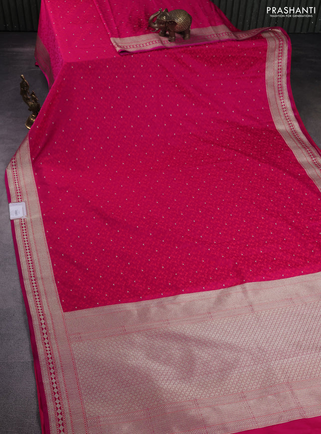 Banarasi semi mushru silk saree pink with allover self emboss & zari buttas and zari woven border