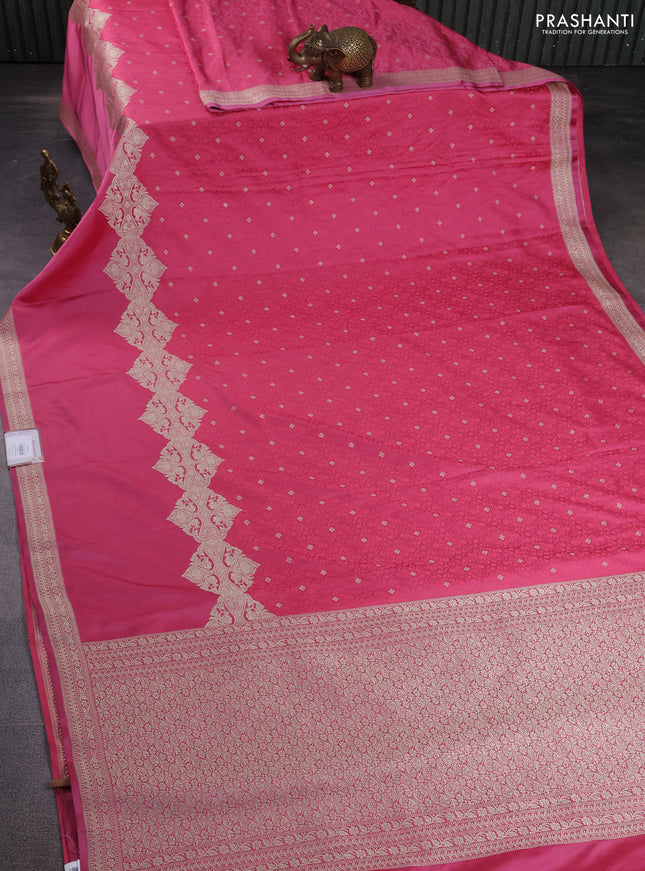Banarasi semi mushru silk saree pink shade with allover self emboss & zari buttas and rettapet zari woven border