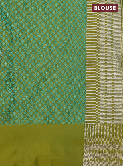 Banarasi semi mushru silk saree dual shade of mustard and teal green shade with allover self emboss and zari woven border
