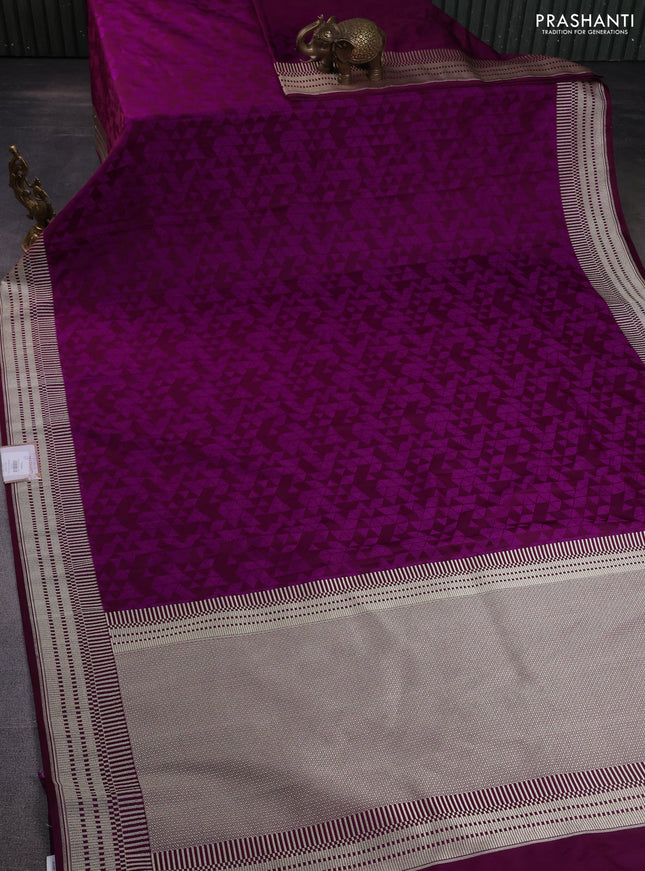 Banarasi semi mushru silk saree purple with allover self emboss and zari woven border