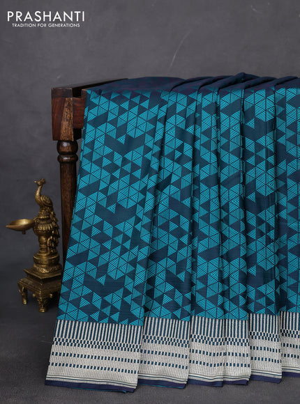 Banarasi semi mushru silk saree dual shade of blue and teal green with allover self emboss and zari woven border
