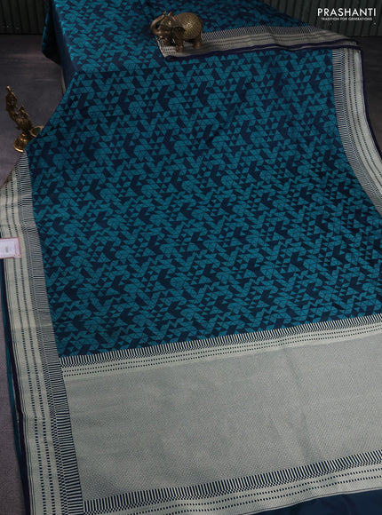 Banarasi semi mushru silk saree dual shade of blue and teal green with allover self emboss and zari woven border
