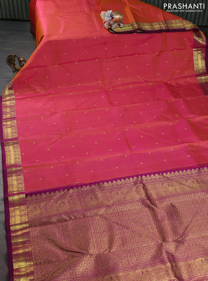 Pure kanchipuram silk saree dual shade of pinkish mustard and purple with zari woven buttas and rich zari woven border