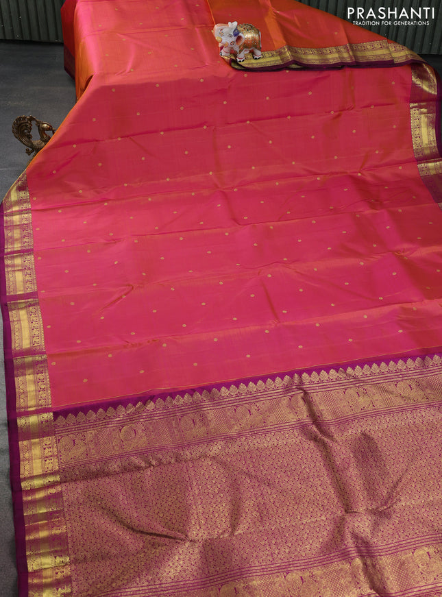 Pure kanchipuram silk saree dual shade of pinkish mustard and purple with zari woven buttas and rich zari woven border