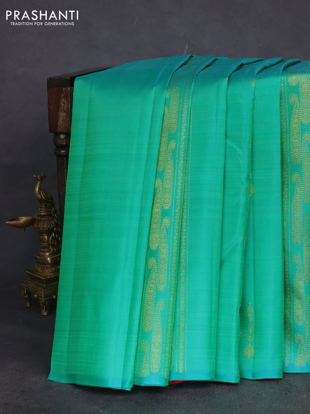Pure kanchipuram silk saree dual shade of teal bluish green and pink with allover zariw weaves & buttas in borderless style