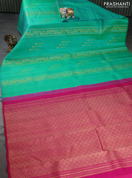 Pure kanchipuram silk saree dual shade of teal bluish green and pink with allover zariw weaves & buttas in borderless style
