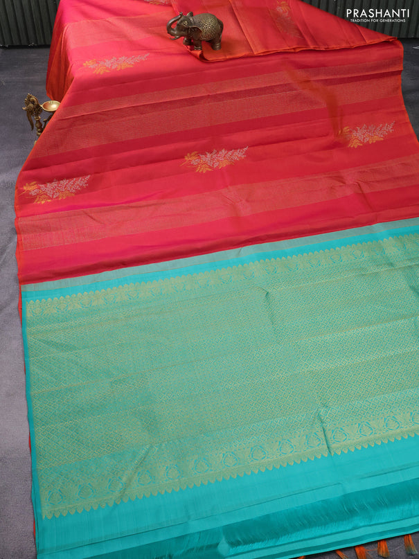 Pure kanchipuram silk saree dual shade of pinkish orange and teal green with zari woven buttas in borderless style