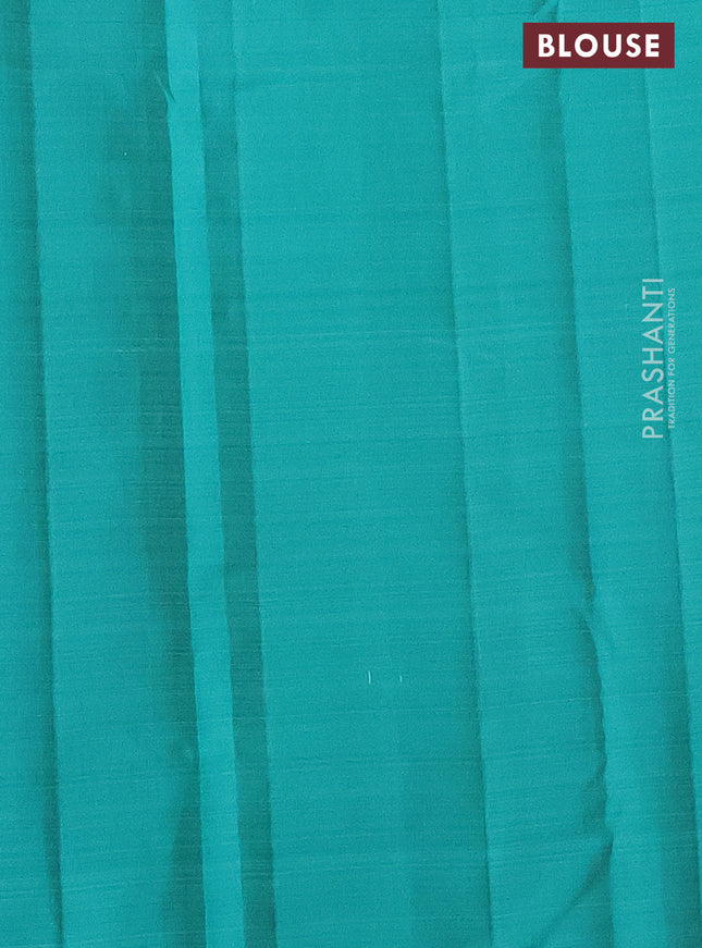 Pure kanchipuram silk saree dual shade of pinkish orange and teal green with zari woven buttas in borderless style