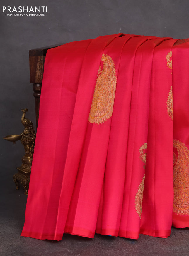 Pure kanchipuram silk saree dual shade of pink and dual shade of teal green with paisley zari woven buttas in borderless style