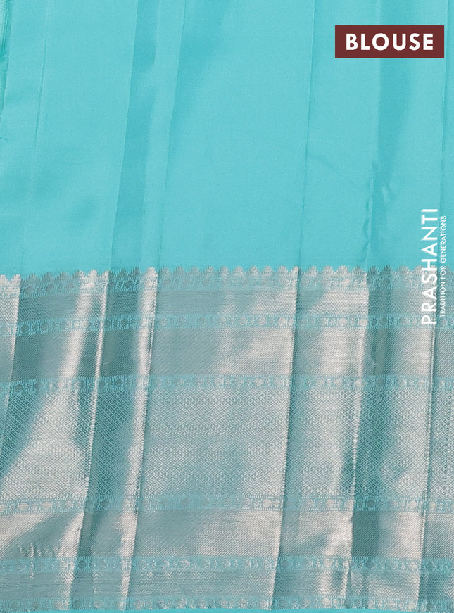Pure kanchipuram silk saree teal blue with allover silver zari weaves and long silver zari woven border