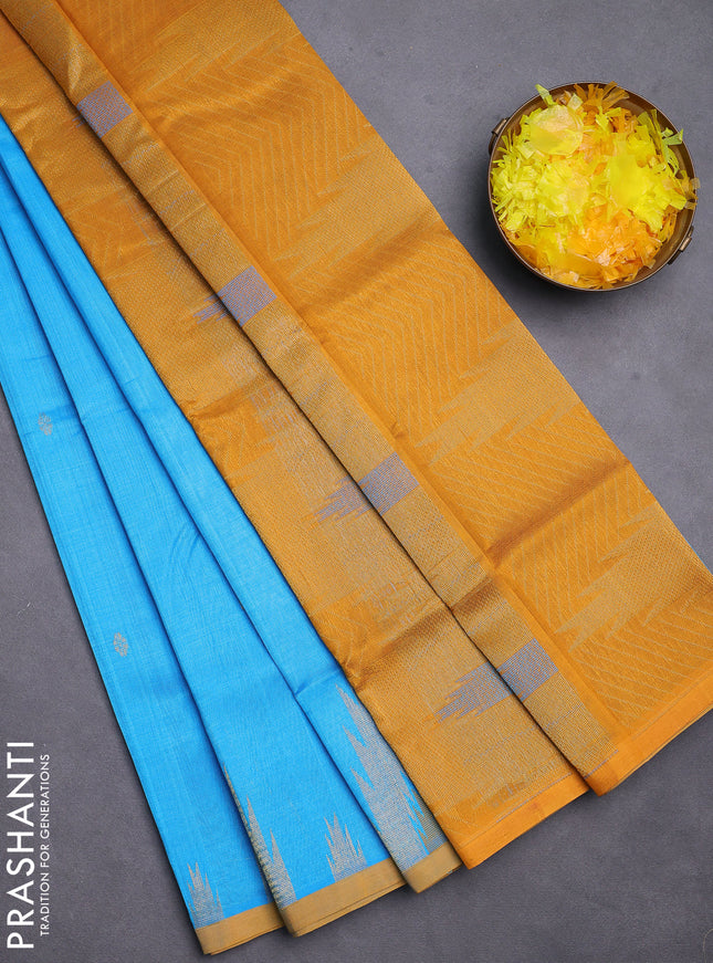 Silk cotton saree blue and dark mustard with zari woven buttas and temple design zari woven butta border