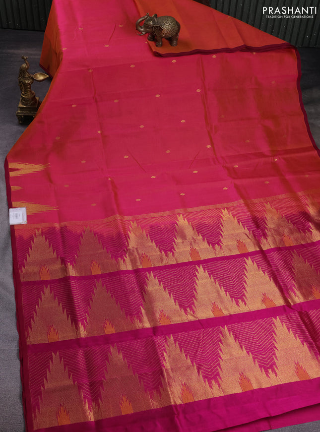 Silk cotton saree dual shade of pinkish orange and magenat pink with zari woven buttas and temple design zari woven butta border
