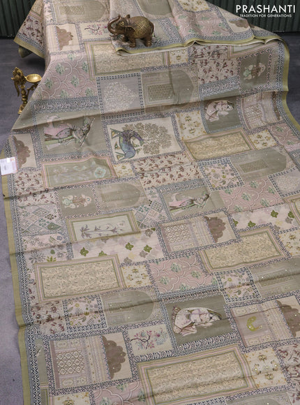 Pure tussar silk saree elaichi green with allover prints & mirror work and printed border