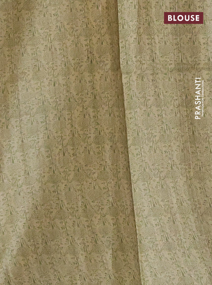 Pure tussar silk saree elaichi green with allover prints & mirror work and printed border