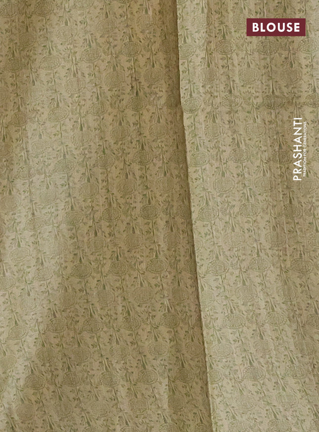 Pure tussar silk saree elaichi green with allover prints & mirror work and printed border