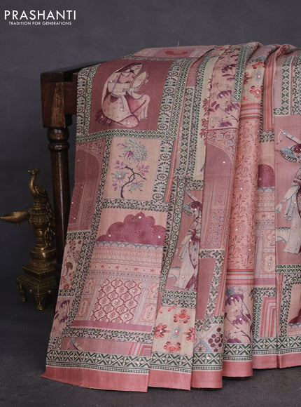 Pure tussar silk saree peach shade with allover prints & mirror work and printed border