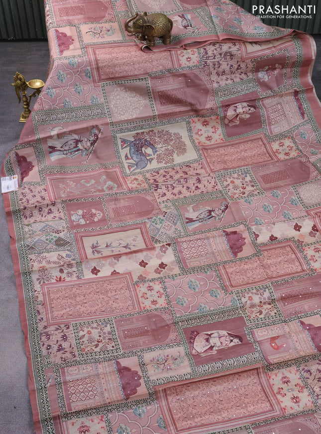 Pure tussar silk saree peach shade with allover prints & mirror work and printed border