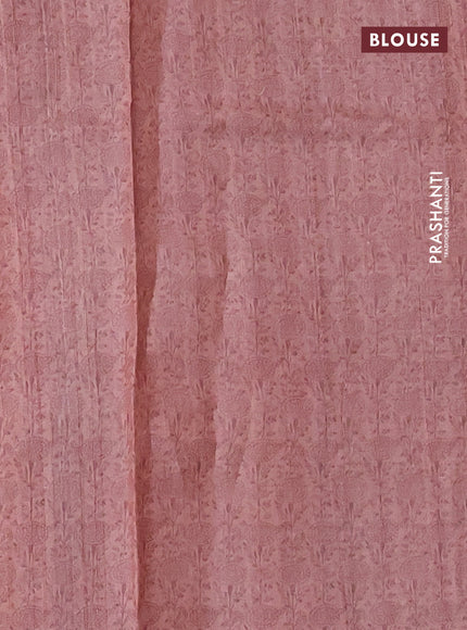 Pure tussar silk saree peach shade with allover prints & mirror work and printed border