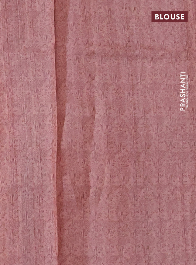 Pure tussar silk saree peach shade with allover prints & mirror work and printed border
