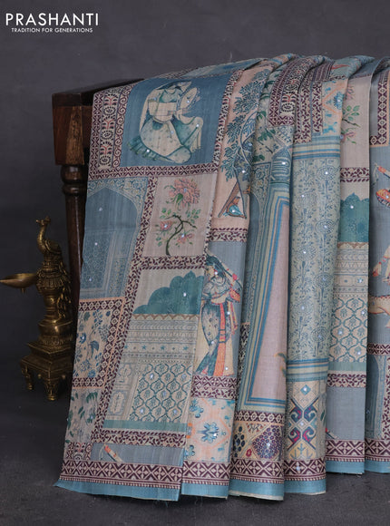 Pure tussar silk saree teal blue with allover prints & mirror work and printed border