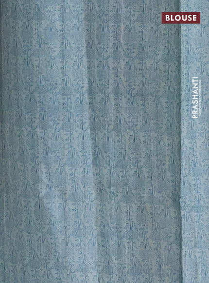 Pure tussar silk saree teal blue with allover prints & mirror work and printed border