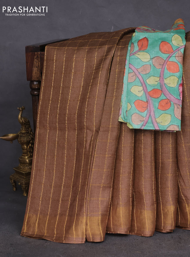 Pure tussar silk saree brown shade and teal green with allover zari checked pattern and zari woven border
