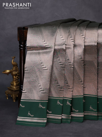 Banarasi katan silk saree green with allover silver zari woven brocade weaves and zari woven butta border